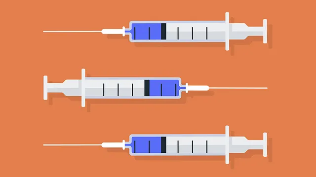 three-grey-syringes-orange-background (1)