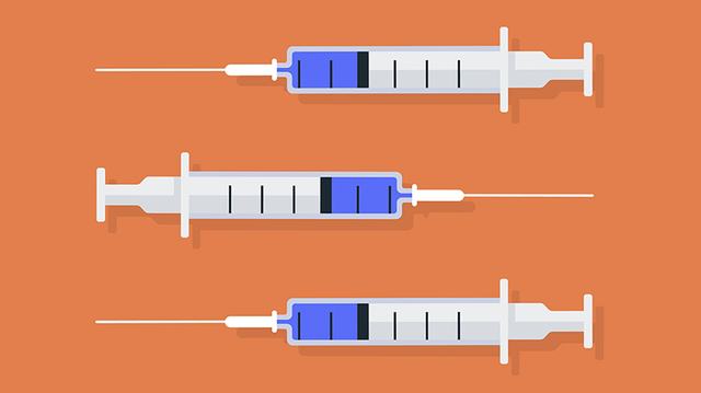 three-grey-syringes-orange-background (1)
